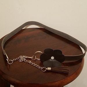 Brown belt with flower and chain